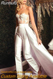 Jumpsuit Wedding Dresses With Detachable Train 2023 A-Line Backless Lace Appliques Bridal Gown Pants Satin Sleeveless